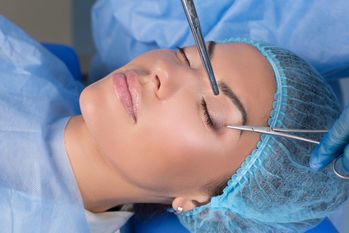 A beautiful middle aged woman, getting prepared for a blepharoplasty procedure
